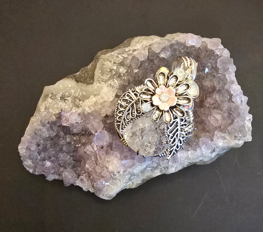 "Moonpetal Bloom" – Raw Quartz Floral Pendant with Silver Detailing